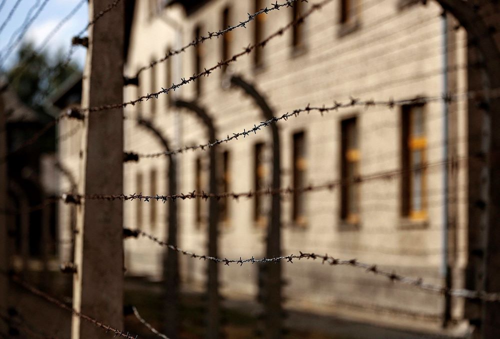 Lines of barbed-wire fencing enclose the Auschwitz-Birkenau Nazi death camp in Oświęcim, Poland, in this Sept. 4, 2015, file photo. (CNS/Nancy Wiechec)