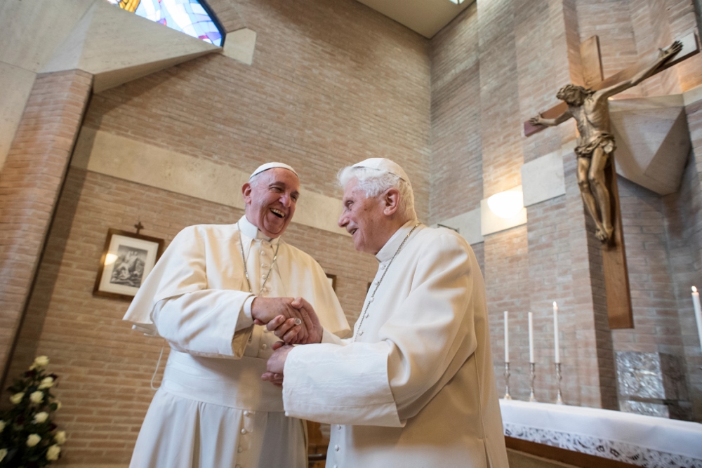 Pope Francis talks with Pope Emeritus Benedict XVI during a visit with new cardinals at the retired pope's residence after a consistory at the Vatican Nov. 19, 2016. (CNS/L'Osservatore Romano, handout)