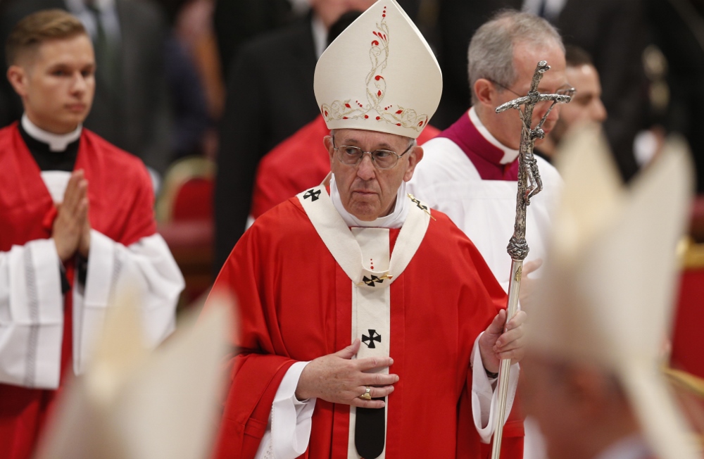 Pope Francis leaves after celebrating Mass marking the feast of Pentecost in St. Peter's Basilica at the Vatican May 20. (CNS/Paul Haring)