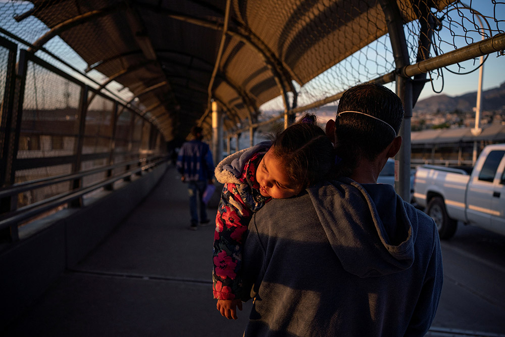 Near El Paso, Texas, a Honduran immigrant affected by the U.S. Migrant Protection Protocols, better known as the "Remain in Mexico" program, walks back to Ciudad Juárez, Mexico, April 20, 2020.