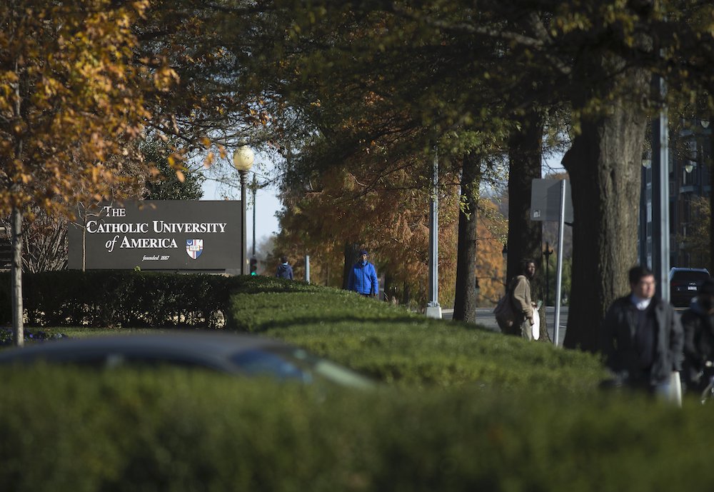 People in Washington walk near the campus of The Catholic University of America Nov. 24, 2020. (CNS/Tyler Orsburn)