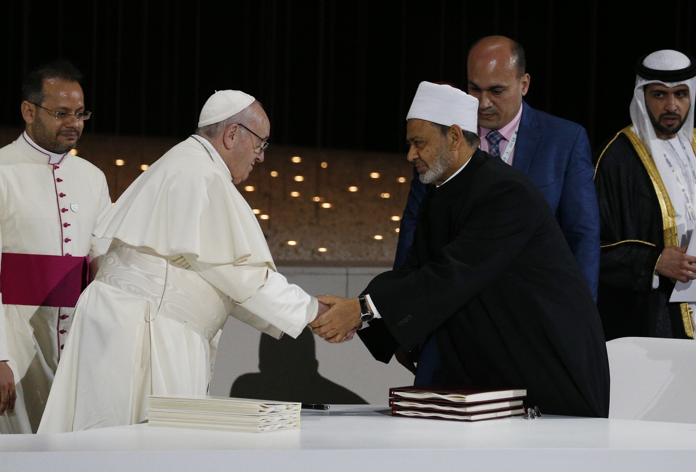 Pope Francis shakes hands with Sheik Ahmad el-Tayeb, grand imam of Egypt's al-Azhar mosque and university, during a document signing at an interreligious meeting at the Founder's Memorial in Abu Dhabi, United Arab Emirates, in this 2019 file photo (CNS)