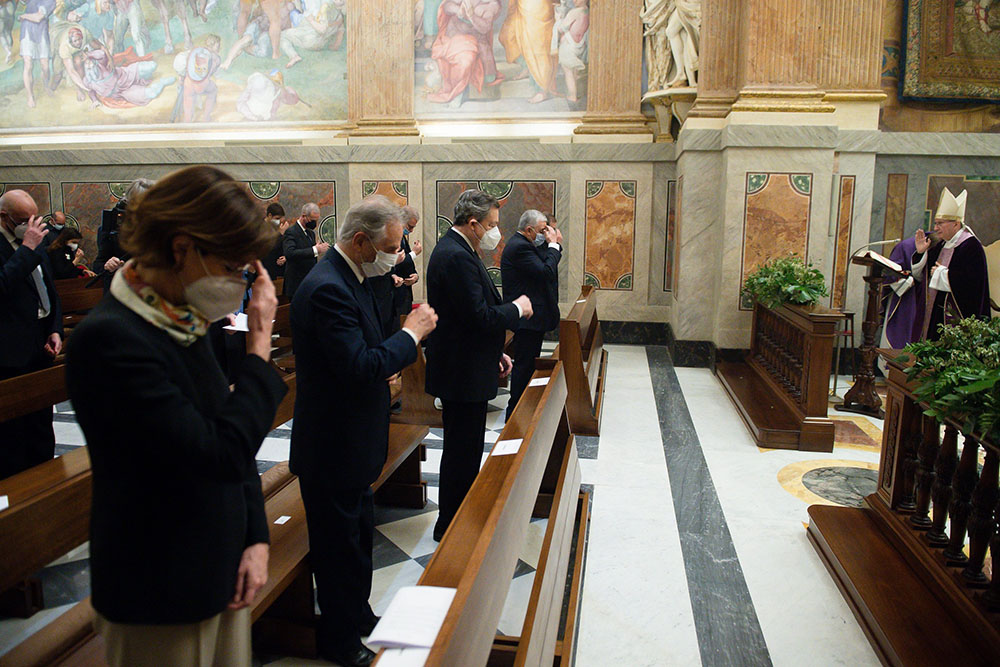 Cardinal Pietro Parolin, Vatican secretary of state, gives a blessing as he celebrates a Mass for the opening of the 92nd judicial year of the Vatican City State court, in the Pauline Chapel at the Vatican March 27. (CNS/Vatican Media)