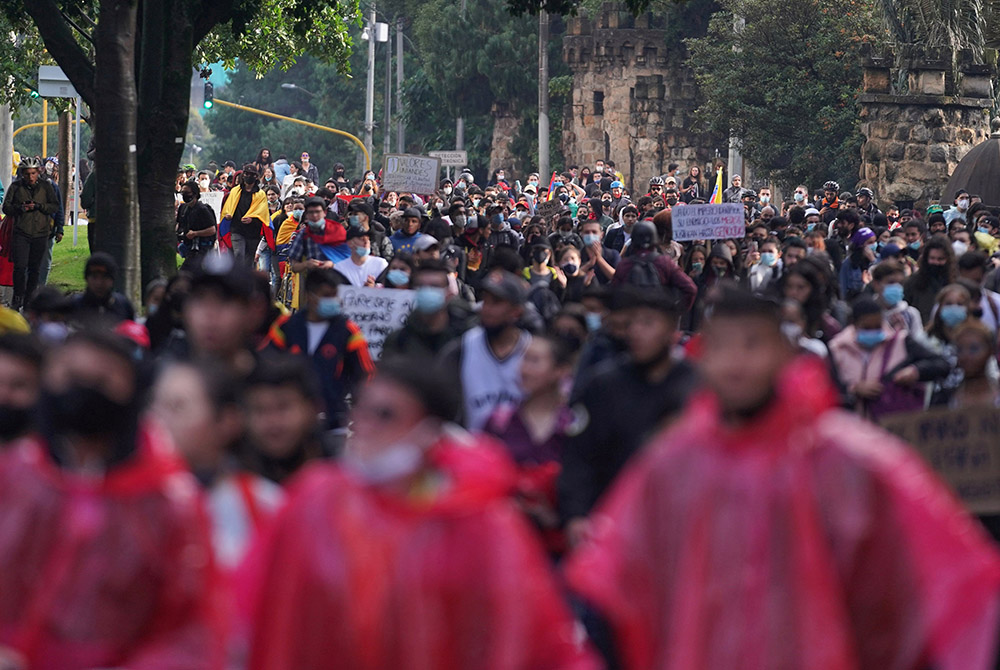 Demonstrators participate in a protest against poverty and police violence May 4 in Bogota, Colombia. (CNS/Nathalia Angarita, Reuters)