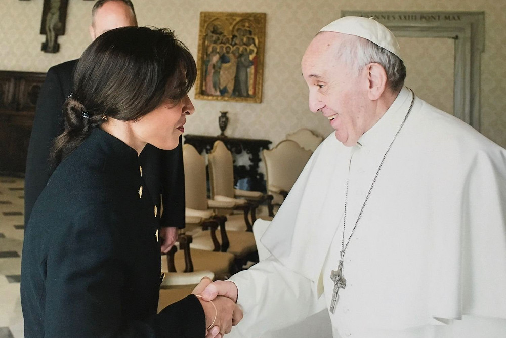 Argentine theologian Emilce Cuda is pictured with the pope at the Vatican March 17, 2017. (CNS/Vatican Media)