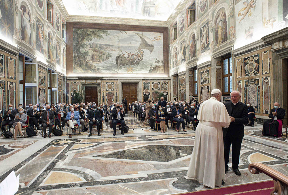 Pope Francis greets Archbishop Vincenzo Paglia during a meeting with members of the Pontifical Academy for Life in the Clementine Hall of the Apostolic Palace at the Vatican Sept. 27. (CNS/Vatican Media)