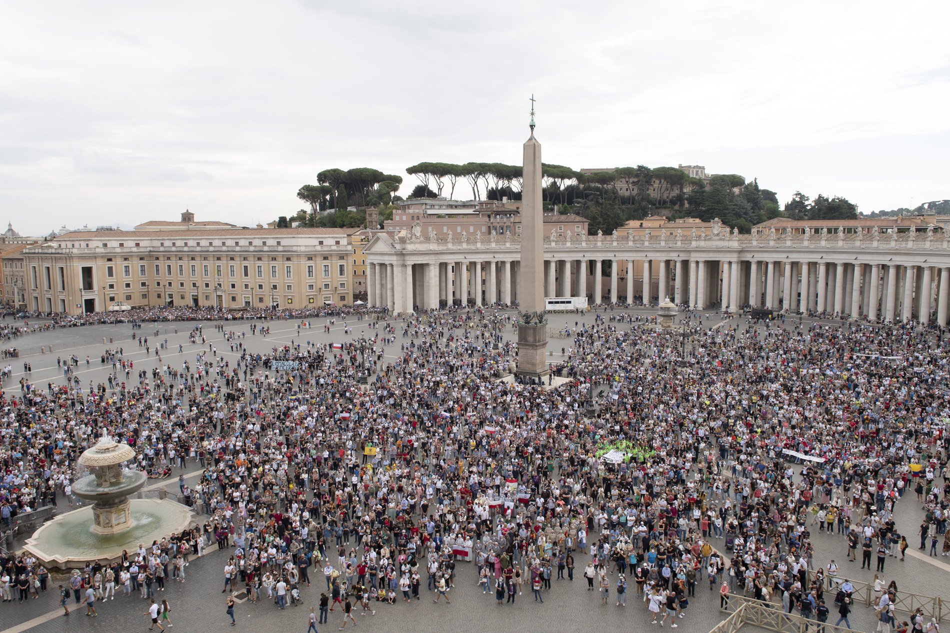 People attend the Angelus led by Pope Francis from the window of his studio overlooking St. Peter's Square at the Vatican Oct. 4, 2021. (CNS photo/Vatican Media)