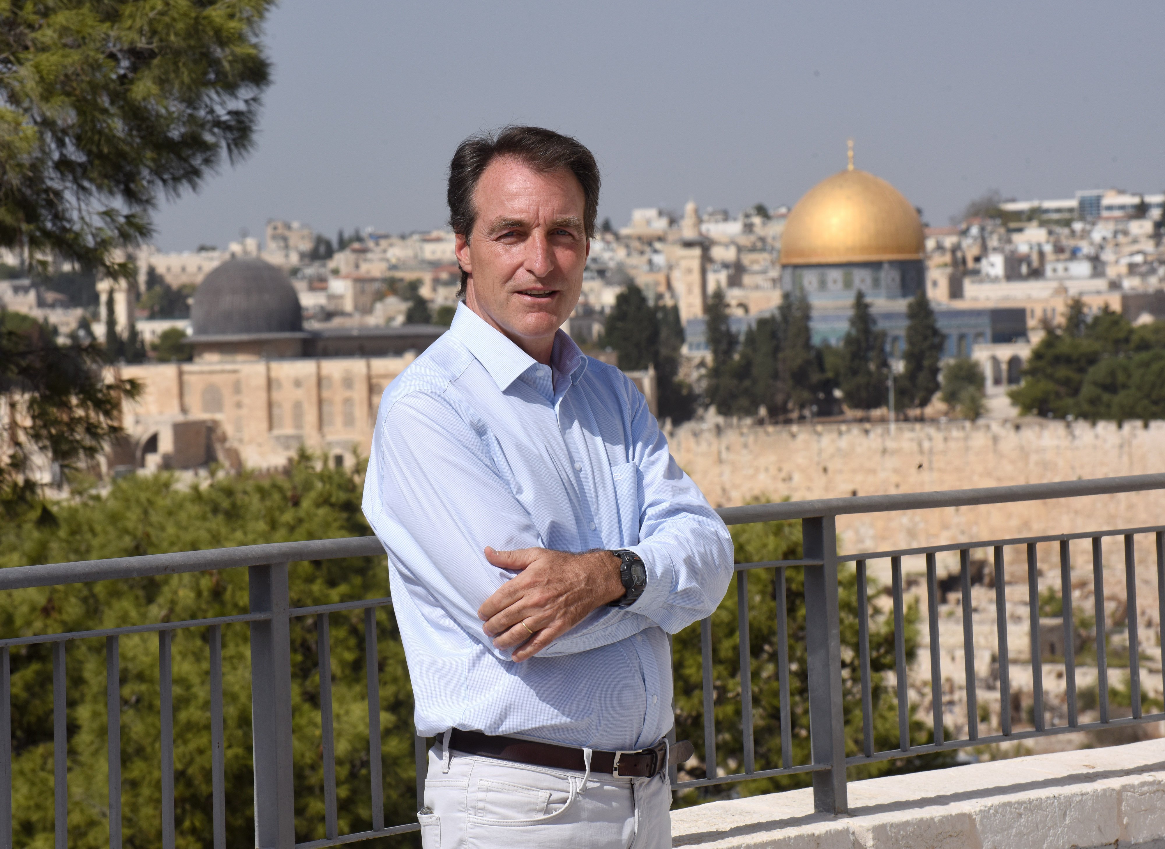 Bernard Thibaud, manager of Abraham's House, poses on the Mount of Olives overlooking Jerusalem Oct. 28, 2021. (CNS photo/Debbie Hill)