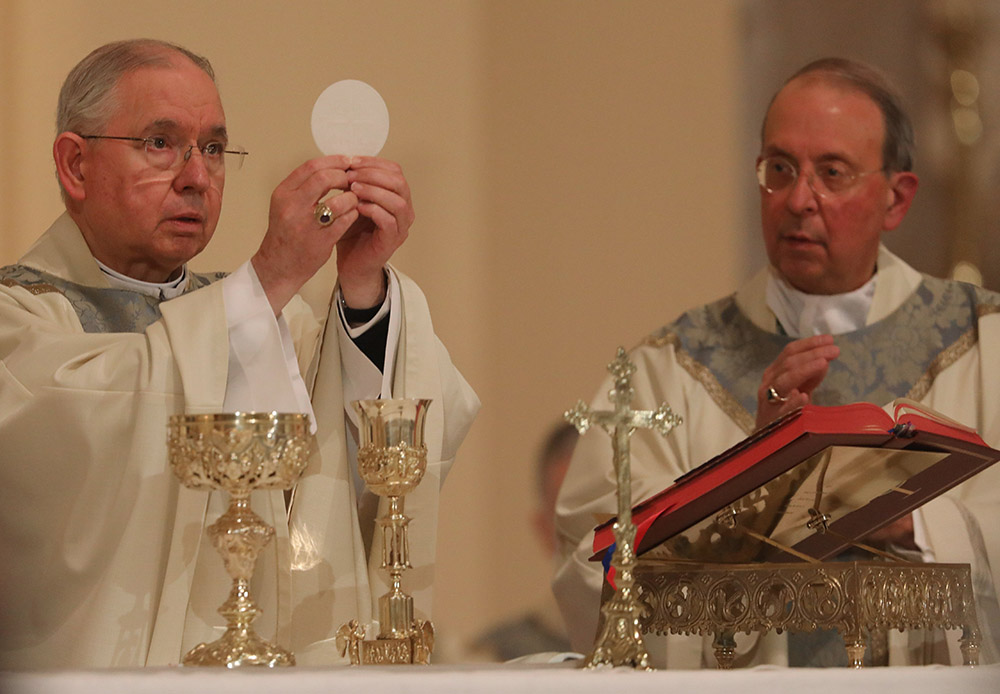 Los Angeles Archbishop José Gomez concelebrates Mass with Archbishop William Lori of Baltimore at the Basilica of the National Shrine of the Assumption of the Blessed Virgin Mary Nov. 15 in Baltimore during the bishops' fall general assembly. (CNS)