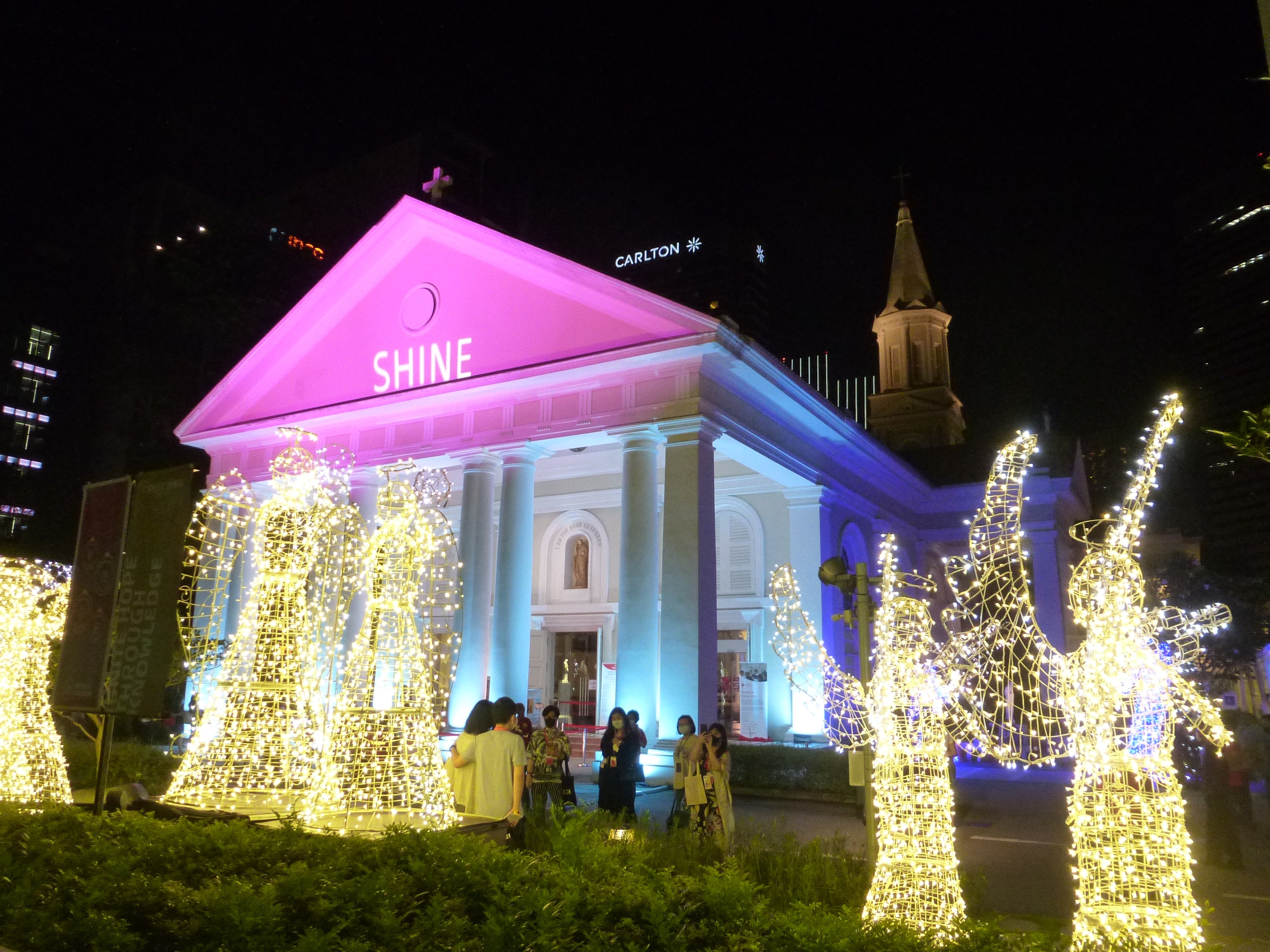 People stand outside the Cathedral of the Good Shepherd Dec. 5, 2021. (CNS photo/Christopher Khoo)