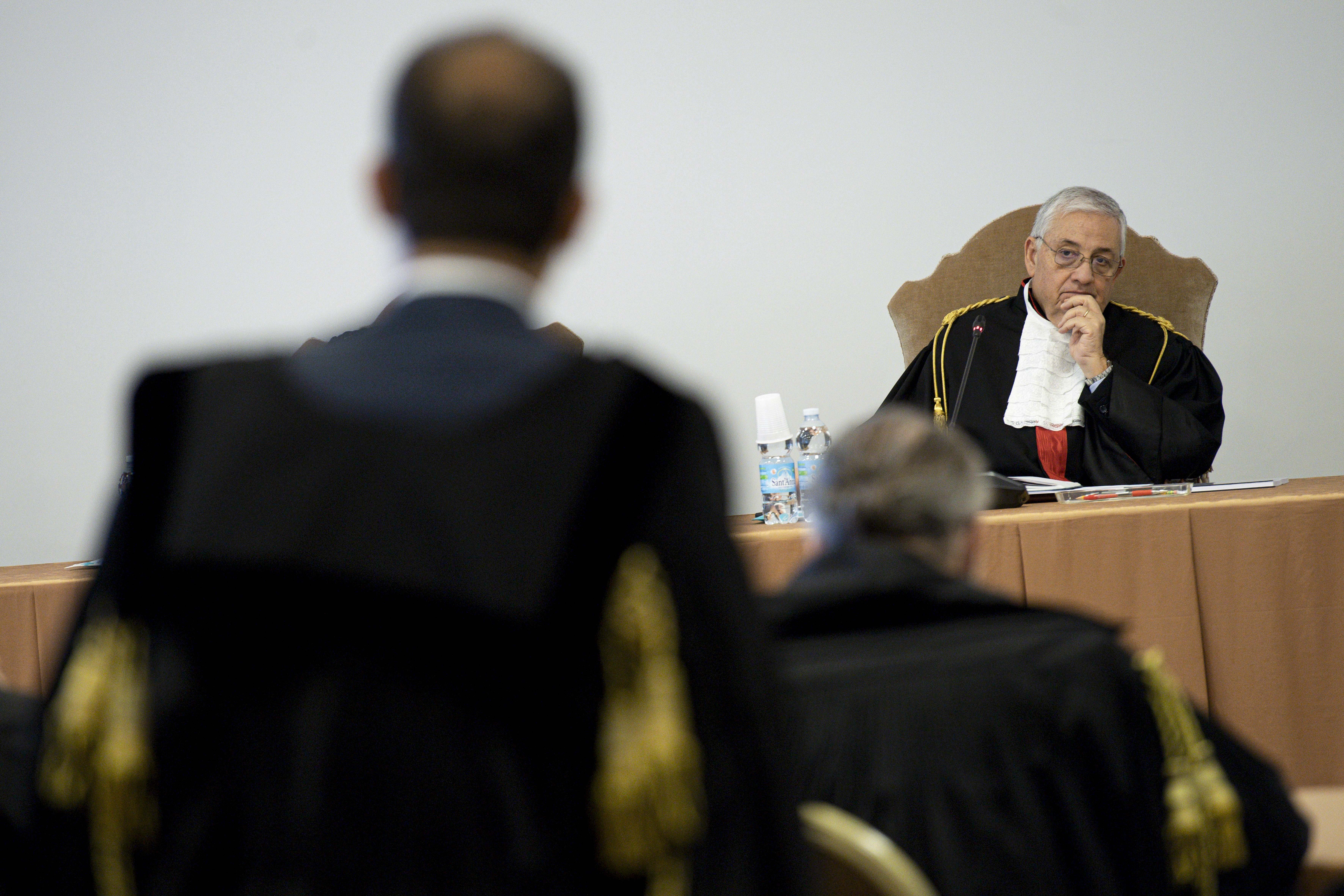 Vatican judge Giuseppe Pignatone listens during the third session of the trial of six defendants accused of financial crimes, at the Vatican City State criminal court in this Nov. 17, 2021. (CNS photo/Vatican Media)