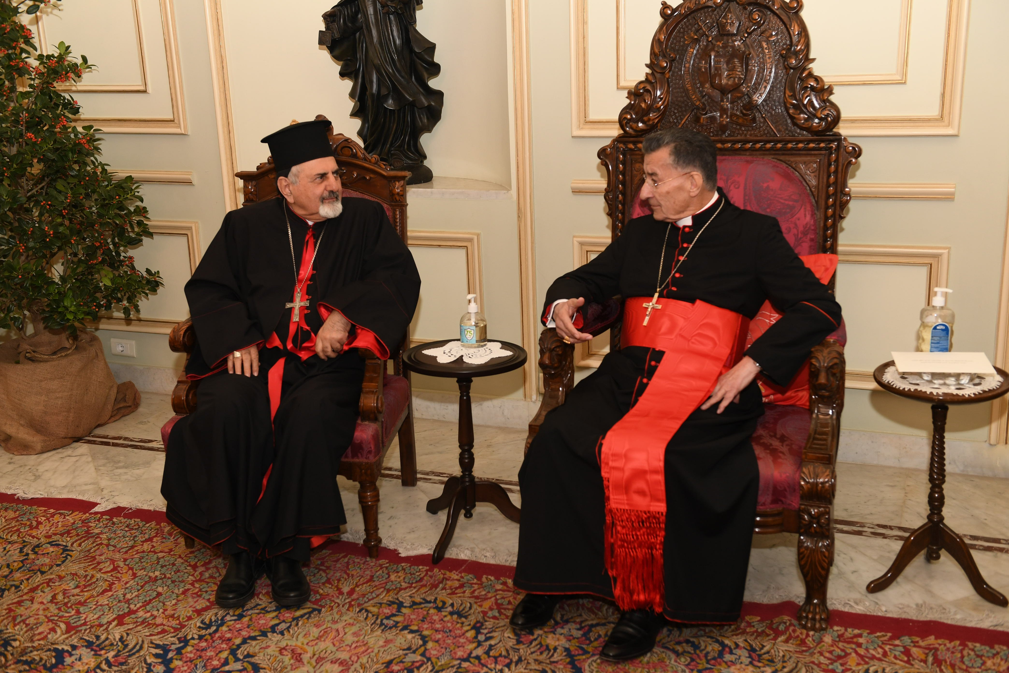 Syriac Catholic Patriarch Ignace Joseph III Younan visits Cardinal Bechara Rai, Maronite Catholic patriarch, to share Christmas greetings at Bkerke, the Maronite patriarchate near Beirut, Dec. 27, 2021. (CNS photo/Mychel Akl for Maronite patriarchate)