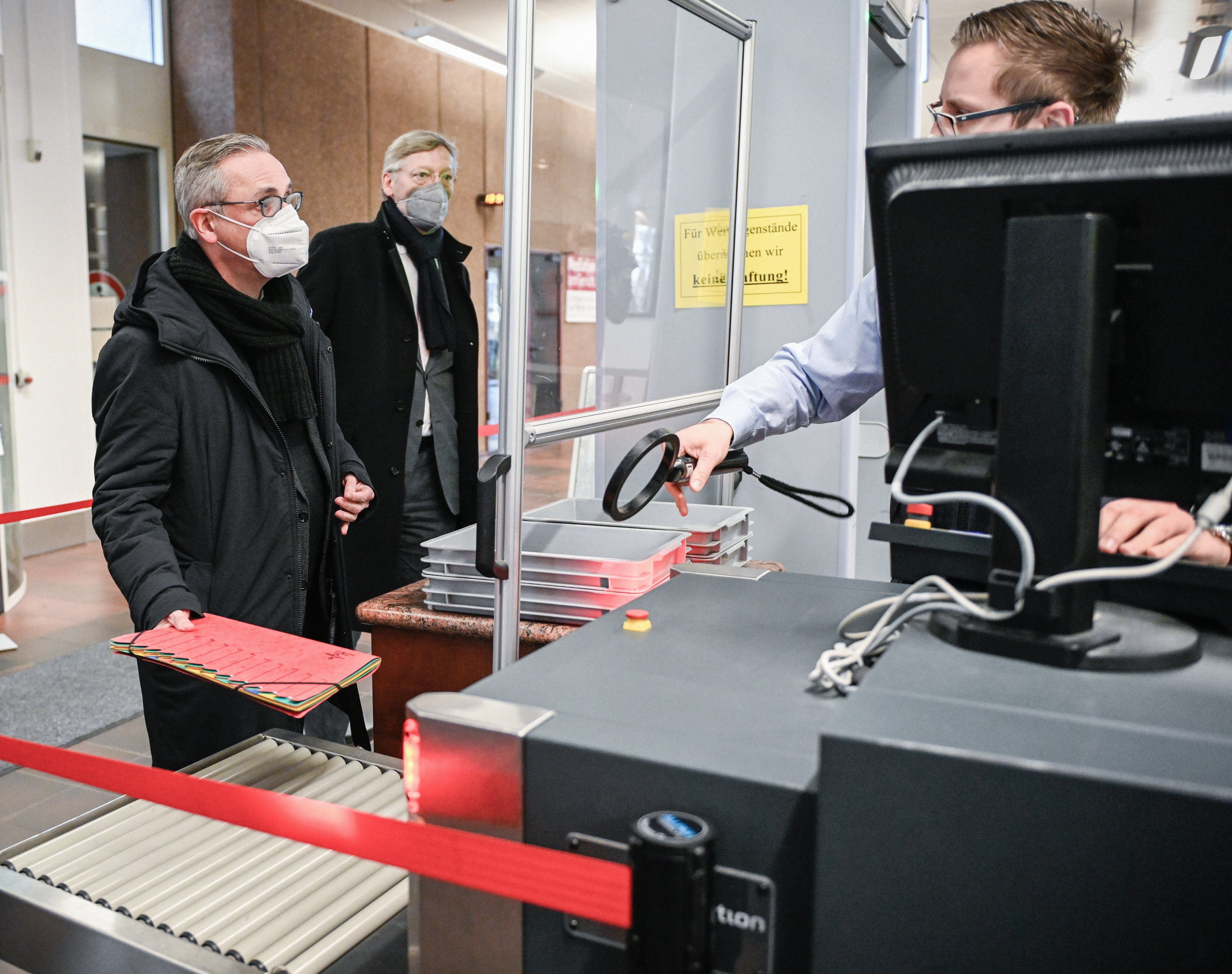 German Archbishop Stefan Hesse of Hamburg enters the security check on his way to the abuse trial at Cologne Regional Court Jan. 18, 2022. (CNS photo/Julia Steinbrecht, KNA)