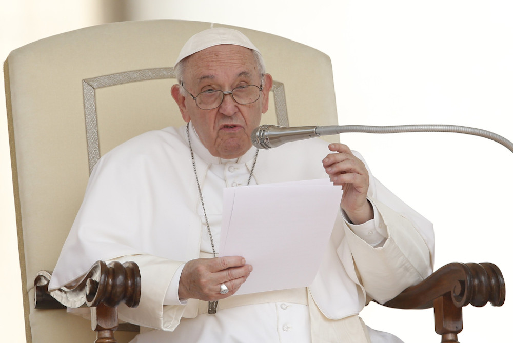 Pope Francis speaks during his general audience in St. Peter's Square at the Vatican June 22. (CNS/Paul Haring)