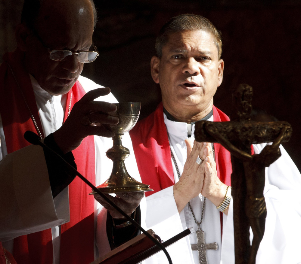 Cardinal Oswald Gracias of Mumbai, India, and Archbishop Felix A. Machado of Vasai, India, celebrate Mass at the Basilica of St. Paul Outside the Walls in Rome, Italy, Sept. 2, 2011