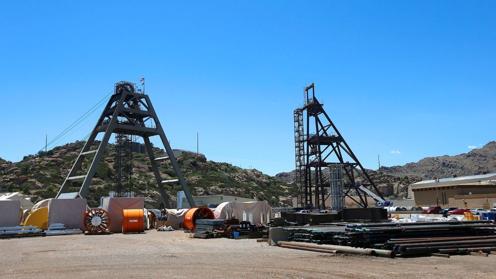 This file photo taken June 15, 2015, shows the Resolution Copper Mining area Shaft #9, right, and Shaft #10, left, that await the expansion go-ahead in Superior, Arizona. The mountainous land near Superior is known as Oak Flat or Chi’chil Biłdagoteel. It’s where Apaches have harvested medicinal plants, held coming-of-age ceremonies and gathered acorns for generations. (AP/Ross D. Franklin)