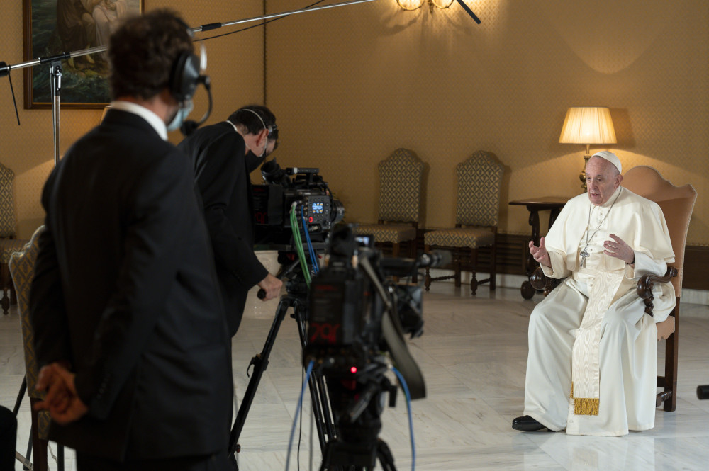 Pope Francis is interviewed at the Vatican for "Stories of a Generation," a Netflix series based on the pope's book, "Sharing the Wisdom of Time." (CNS/Vatican Media/Simone Risoluti)