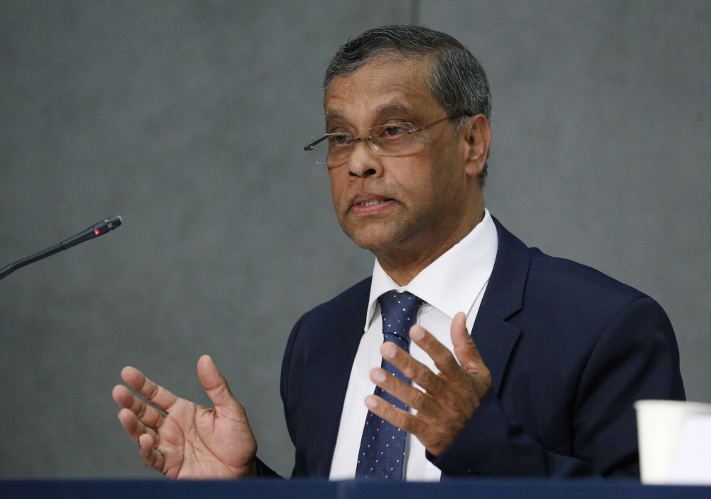 Aloysius John, then secretary-general of Caritas Internationalis, speaks during a news conference for the conclusion of the Caritas project, "Share the Journey," at the Vatican June 15, 2021. (CNS photo/Paul Haring)