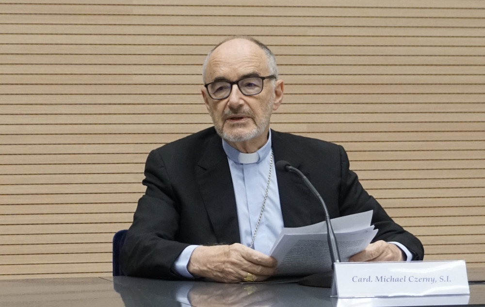 Cardinal Michael Czerny, prefect of the Vatican Dicastery for Promoting Integral Human Development, speaks at a news conference for the release of Pope Francis' message for the Jan. 1 celebration of World Peace Day at the Vatican Dec. 16, 2022. (CNS photo/Cindy Wooden)