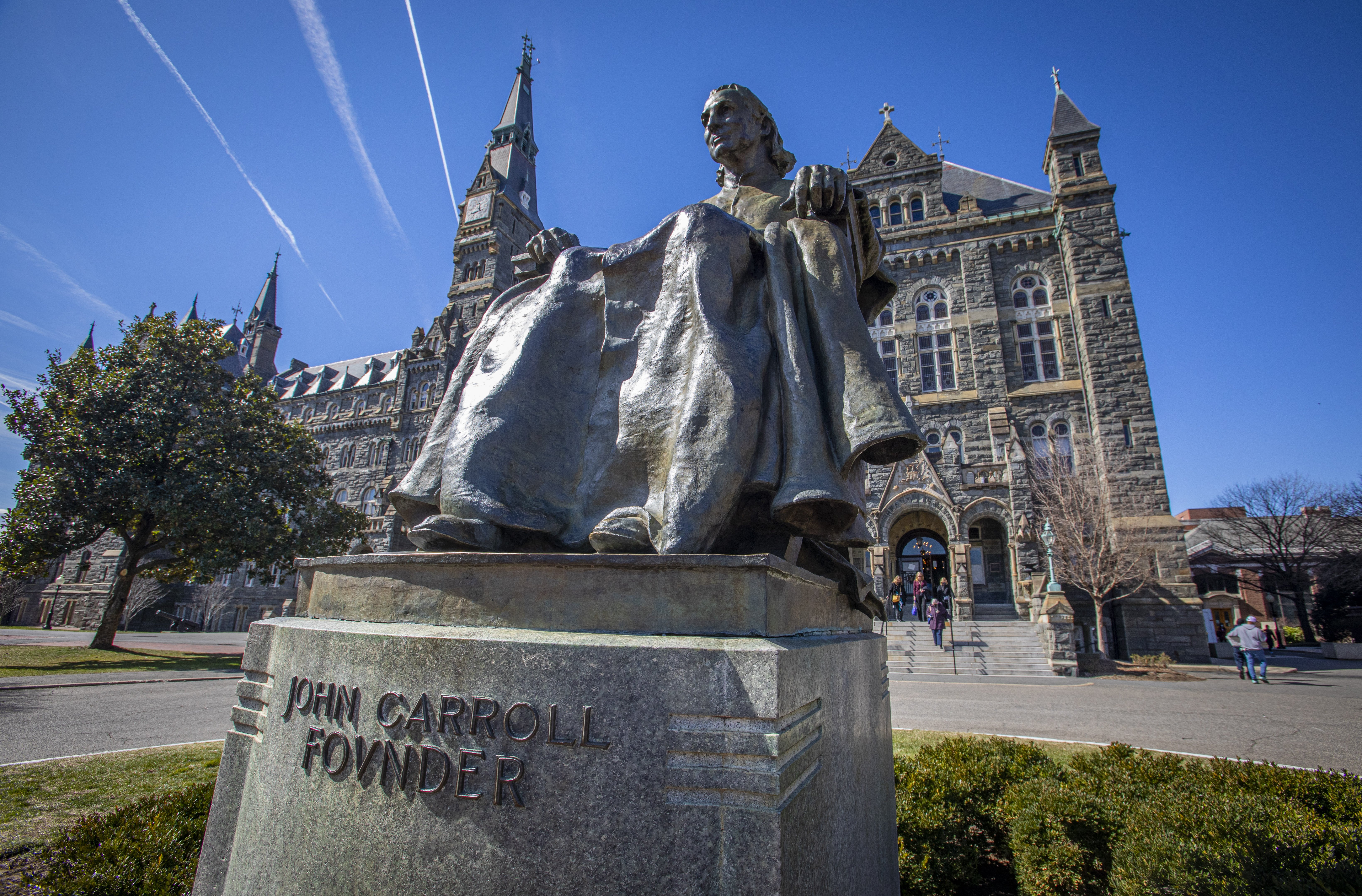 A statue of Baltimore Archbishop John Carroll, the first Catholic bishop in the United States and founder of Georgetown University, is seen on the Jesuit-run school's Washington campus March 3, 2022. Documents show Archbishop Carroll owned at least two slaves. (CNS/Chaz Muth)