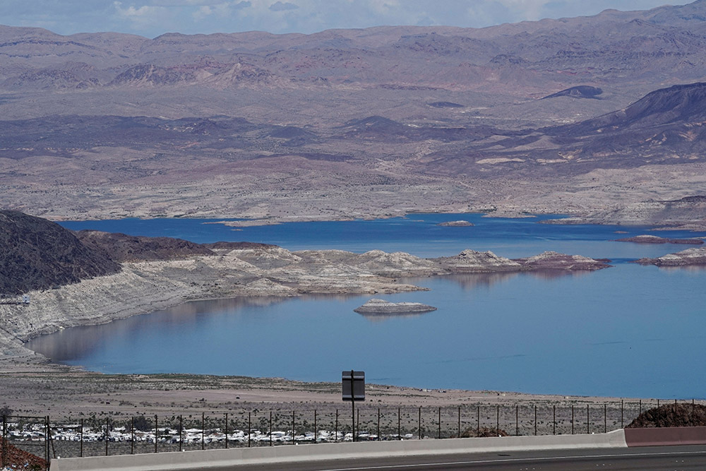 An elevated view shows the dramatic decline of water levels at Lake Mead near Boulder City, Nevada, March 13. The nation's largest reservoir has reached its lowest water levels on record since it was created by damming the Colorado River in the 1930s, as growing demand for water and climate change shrink the Colorado River and endanger a water source millions of Americans depend on. (OSV News/Reuters/Bing Guan)