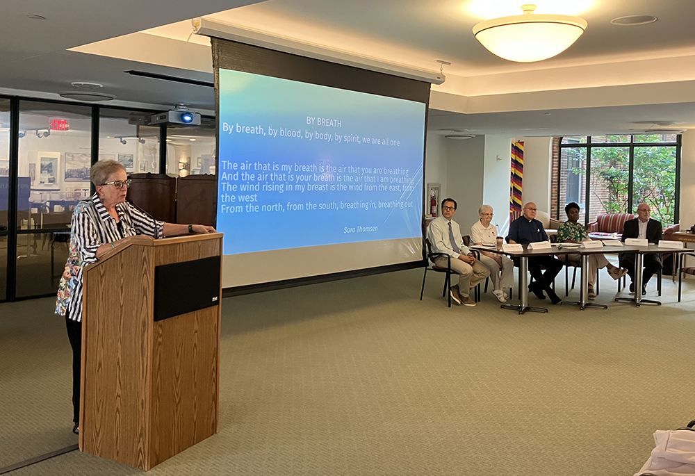 IHM Sr. Barbara Stanbridge welcomes event attendees and leads an opening prayer with a song called "By Breath" by Sara Thomsen. (Amy Ketner)