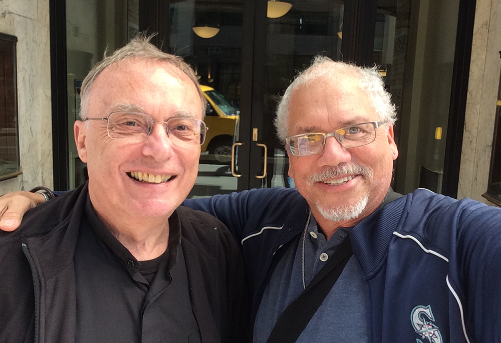 Daryl Grigsby, at right, is pictured with Fr. Paul Magnano, the priest who confirmed him in 1998. (Courtesy of Daryl Grigsby)