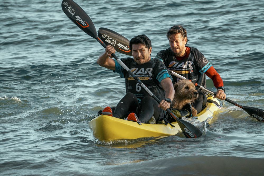 Simu Lu and Mark Wahlberg appear in "Arthur the King." (Courtesy of Lionsgate/Carlos Rodriguez)