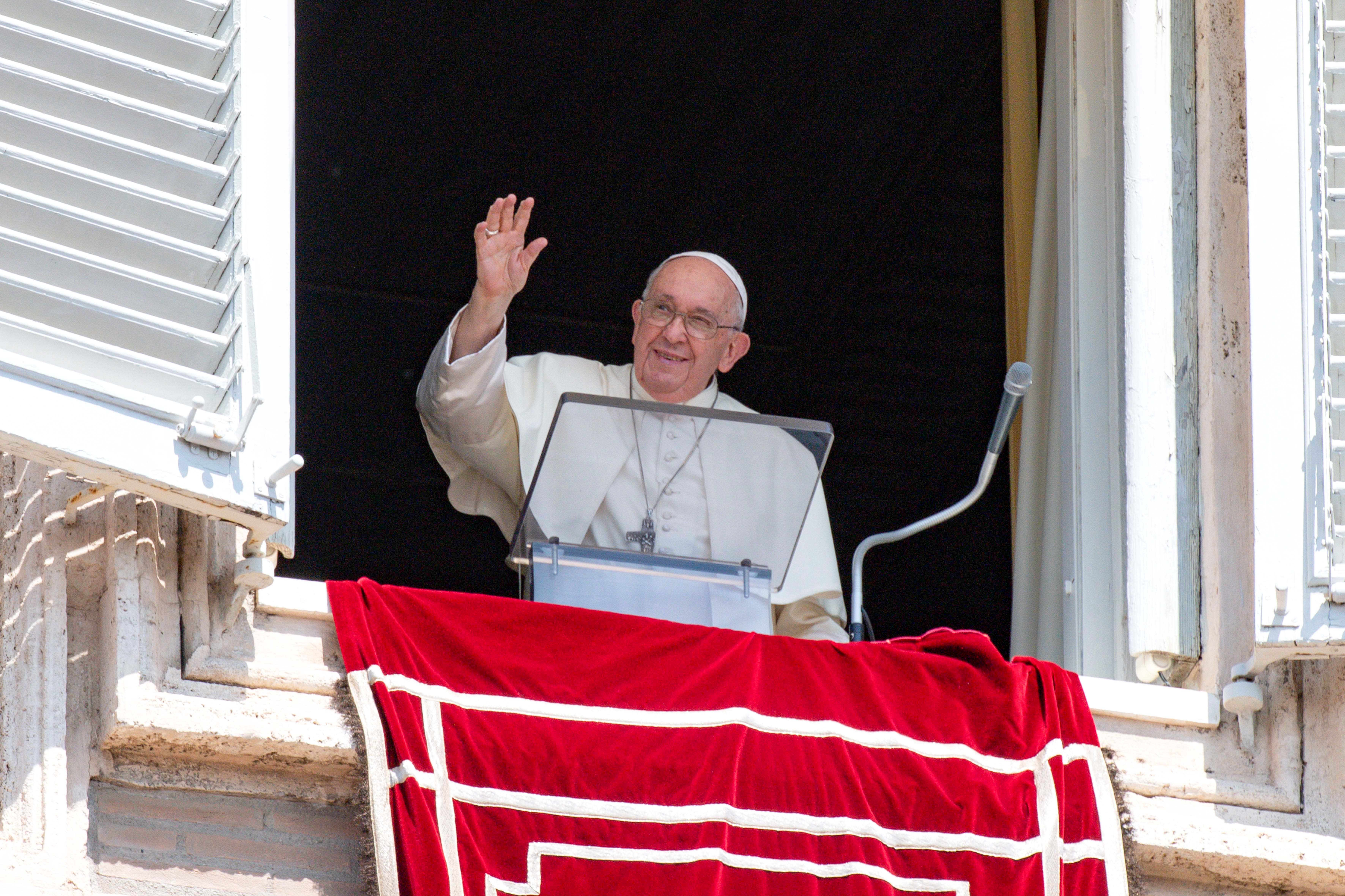 Pope Francis greets visitors in St. Peter's Square at the Vatican to pray the Angelus Aug. 20, 2023. (CNS/Vatican Media)