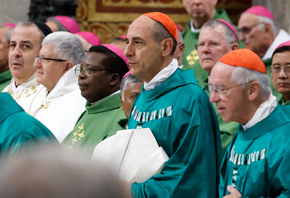 Cardinal Victor Manuel Fernández, prefect of the Dicastery for the Doctrine of the Faith, is seen in a file photo as he joins Pope Francis for a Mass at the end of the first session of the assembly of the Synod of Bishops on synodality in St. Peter's Basilica Oct. 29, 2023, at the Vatican. (CNS/Lola Gomez)