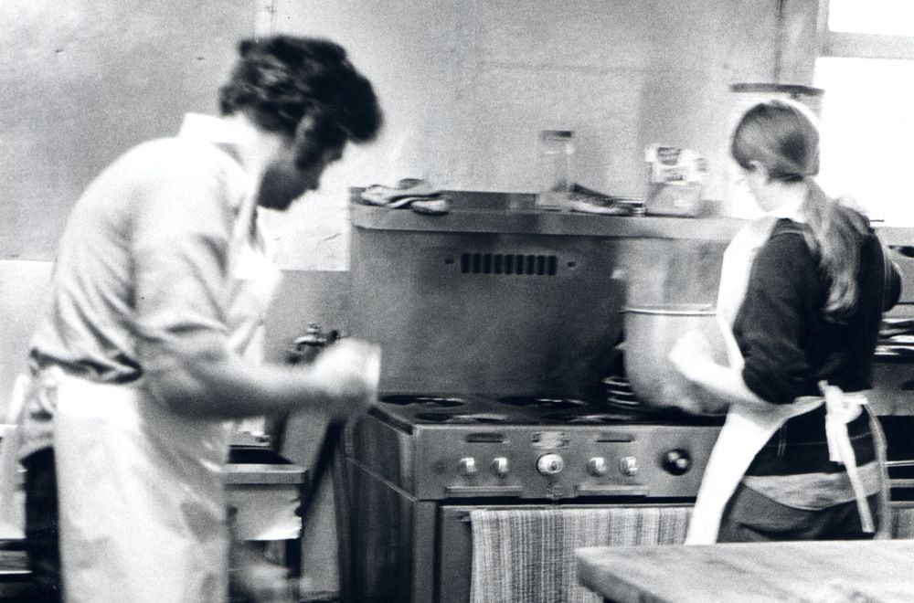 Community members work in the soup kitchen of the Los Angeles Catholic Worker in 1977. (NCR photo/Patty Edmonds)