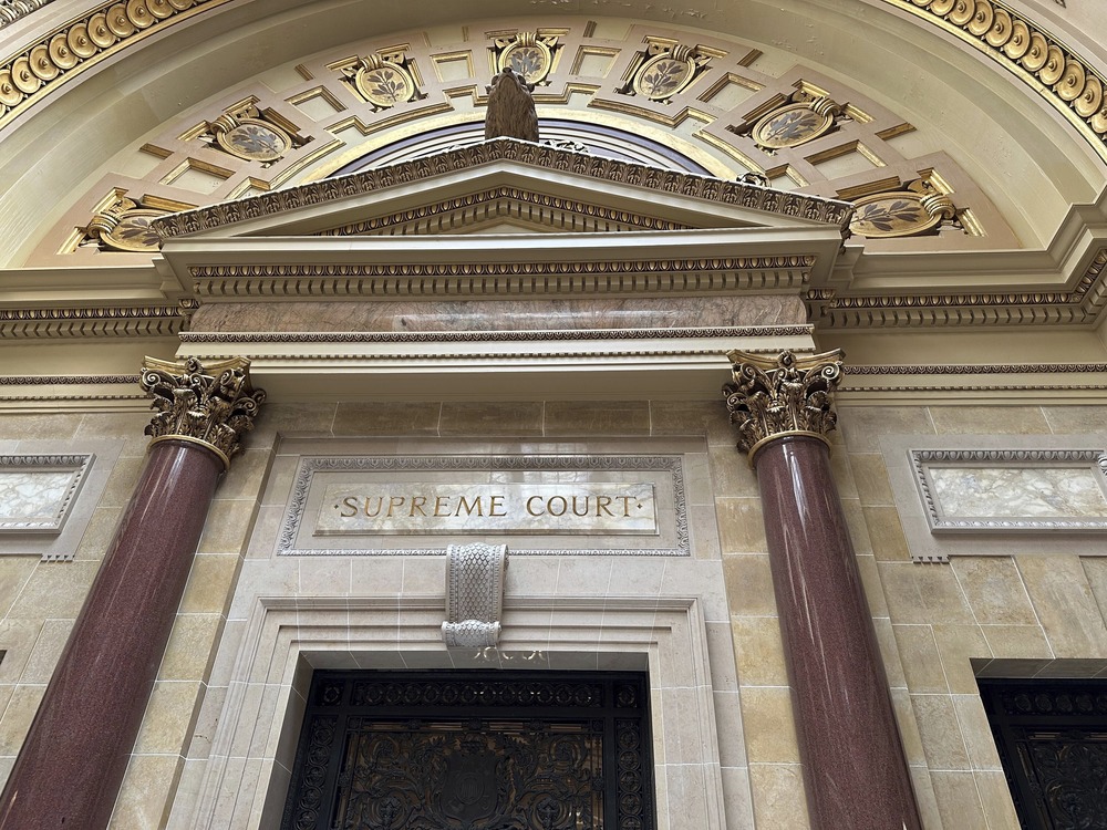 Looming marble entrance to Wisconsin Supreme Court Chambers