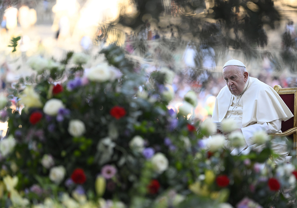 Pope Francis listens during an ecumenical prayer vigil before the assembly of the Synod of Bishops in St. Peter's Square at the Vatican Sept. 30, 2023. (CNS/Vatican Media)