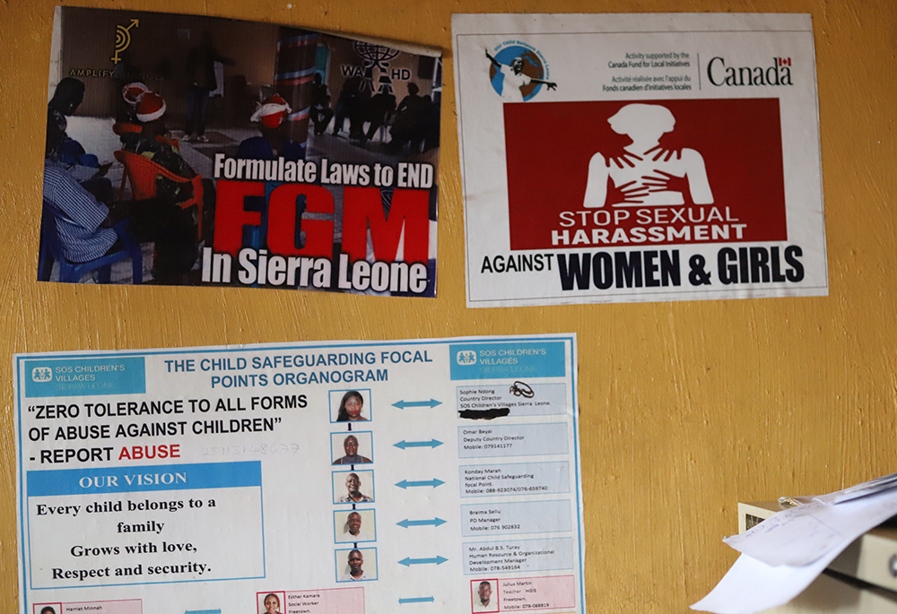 Posters calling for the end of violence and rape against women in Sierra Leone are displayed on the wall of the Caritas office in Waterloo, a southern town of Sierra Leone. The Catholic Church is partnering with other stakeholders to fight the rampant sexual abuse against girls and women. (GSR photo/Doreen Ajiambo)