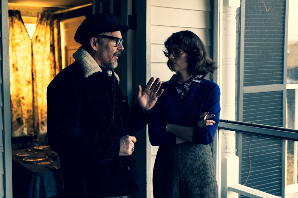 Writer-director Ethan Hawke, left, and his daughter, actor Maya Hawke, talk on the set of "Wildcat."