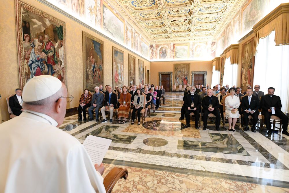 Pope Francis meets with cosmologists, theoretical physicists and scientists taking part in a conference about black holes and gravitational waves during a private audience at the Vatican June 20, 2024. (CNS/Vatican Media)
