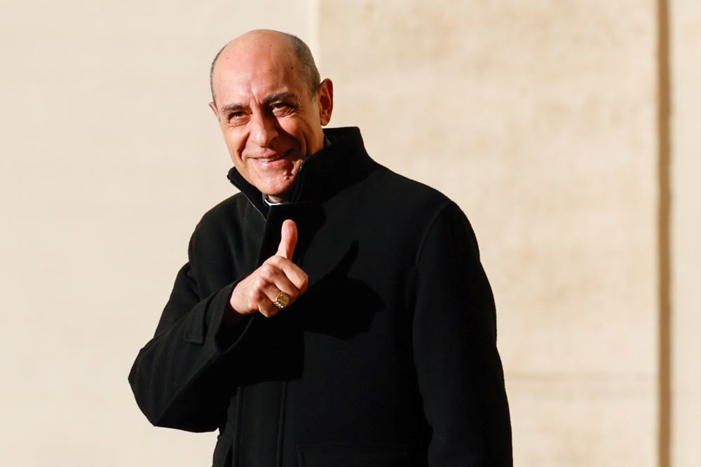 Cardinal Víctor Manuel Fernández, prefect of the Dicastery for the Doctrine of the Faith, gives a thumb up to journalists in the San Damaso Courtyard of the Apostolic Palace at the Vatican Feb. 12, 2024. (CNS/Lola Gomez)