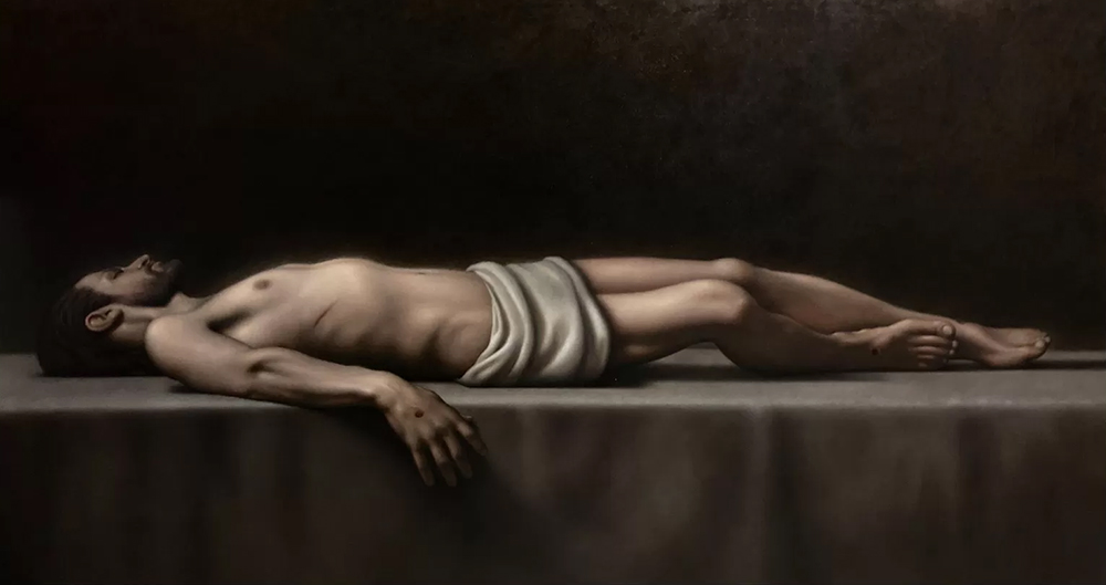 "Entombment" by Robert Armetta is a nearly life-size portrait, approximately 6 feet long and 4 feet high. Arnetta earned first place in the show for his evocative portrayal of Christ in the grave. (Courtesy of St. Edmund's Retreat)