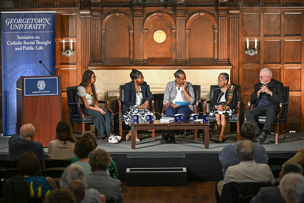 Participants in Georgetown University's June 4 panel discussion on "The Civil Rights Act of 1964 After 60 Years" were, from left: Kessley Janvier, Diann Rust-Tierney, moderator Kimberly Mazyck, Mercy Sr. Cora Marie Billings and the Rev. Jim Wallis. (Courtesy of Georgetown University/Rafael Suanes)