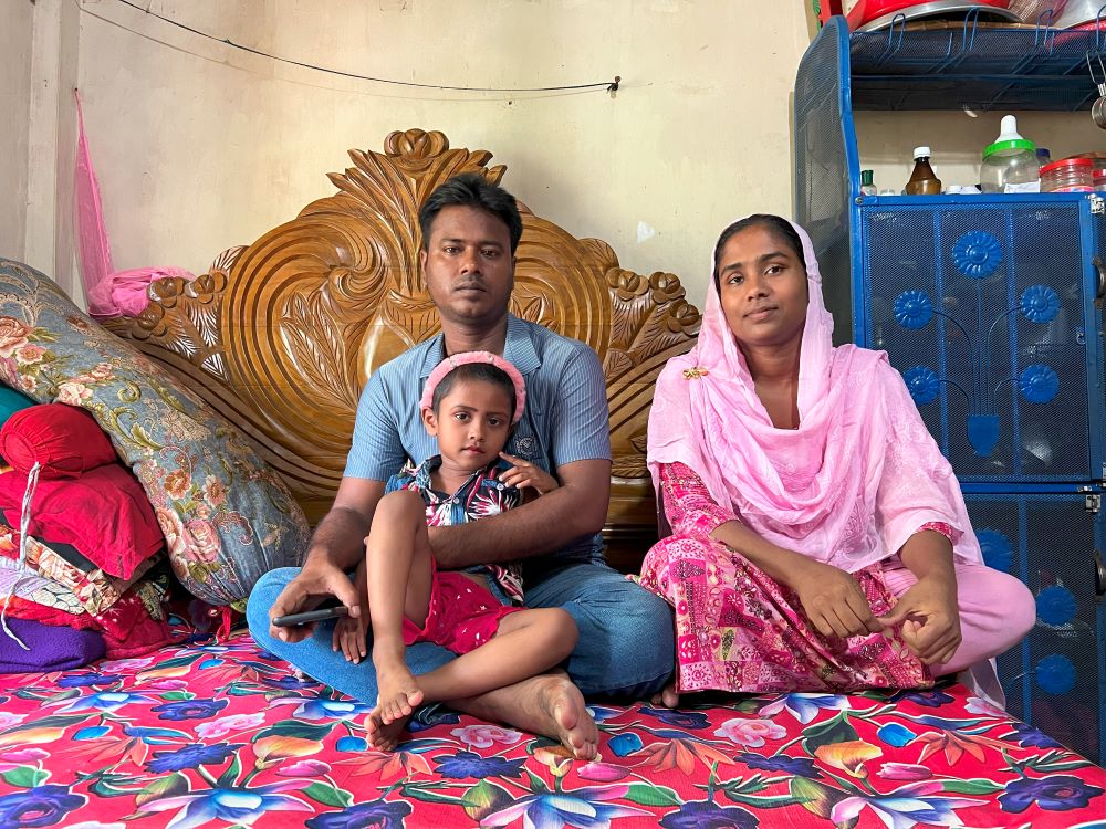 Shamim, Muntaha, and Khadiza Akhter at home in Savar. (Grist/Mahadi Al Hasnat)