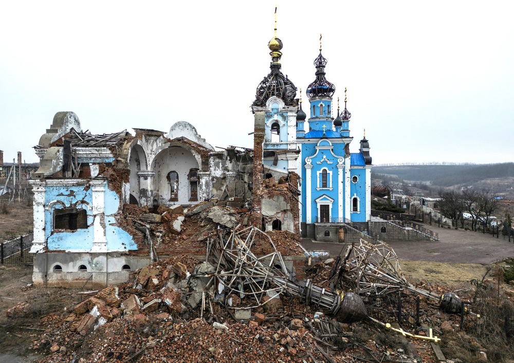 Church left in ruins in desolate countryside. 