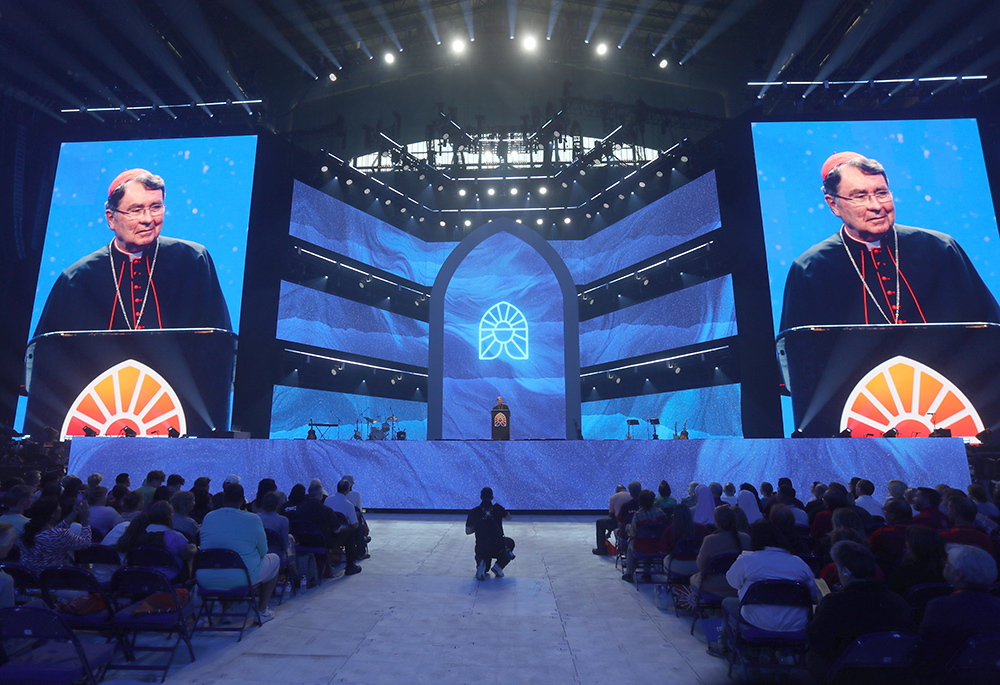 Cardinal Christophe Pierre, the Vatican nuncio to the United States, speaks during the opening revival night of the National Eucharistic Congress, July 17 at Lucas Oil Stadium in Indianapolis. (OSV News/Bob Roller)