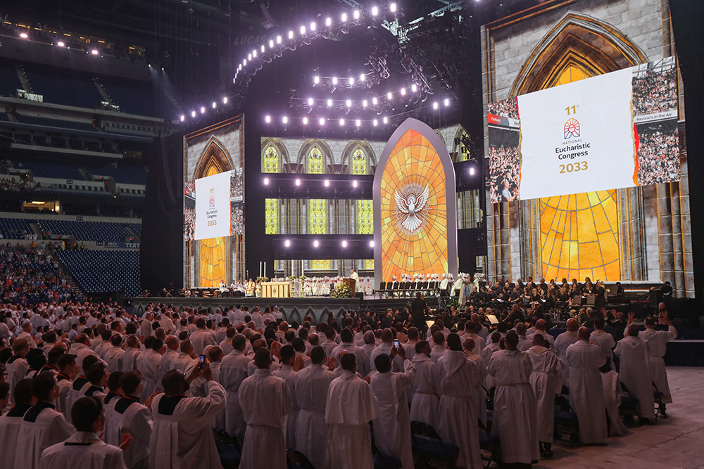 Bishop Andrew Cozzens of Crookston, Minnesota, announces July 21 — the final day of the National Eucharistic Congress at Lucas Oil Stadium in Indianapolis — that a Eucharistic pilgrimage from Indianapolis to Los Angeles is being planned for spring 2025. Congress organizers were also considering holding an 11th National Eucharistic Congress in 2033. (OSV News/Bob Roller)