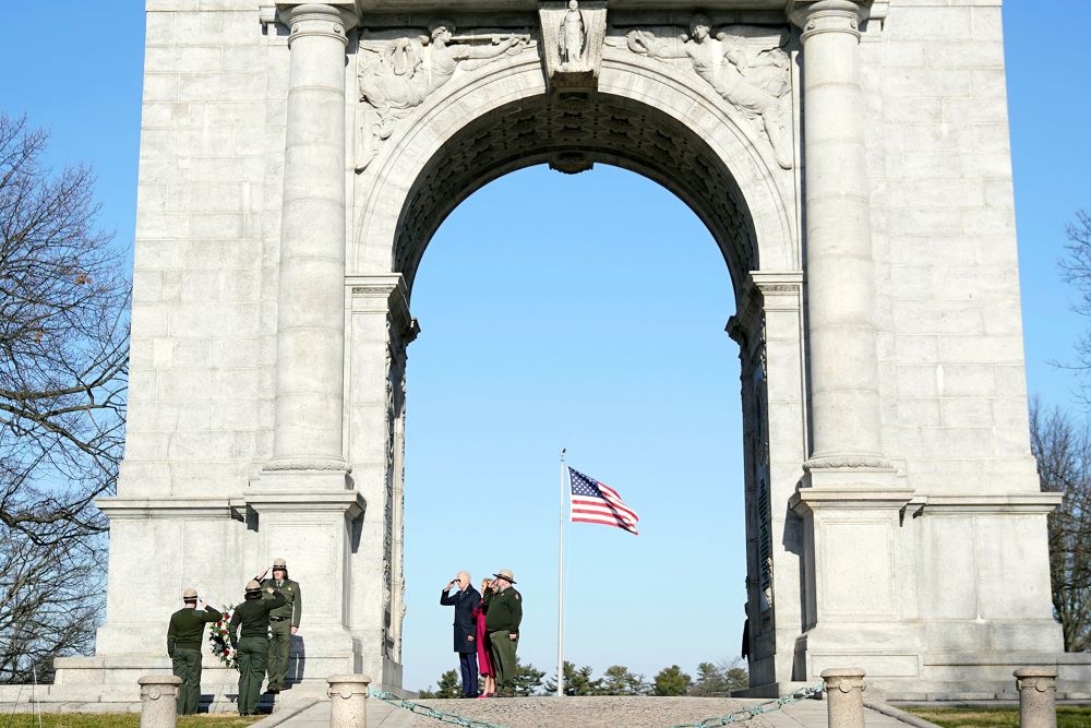 President Joe Biden and first lady Jill Biden participate in a memorial wreath ceremony at the National Memorial Arch at Valley Forge National Historic Park in Valley Forge, Pa., Jan. 5, 2024. 