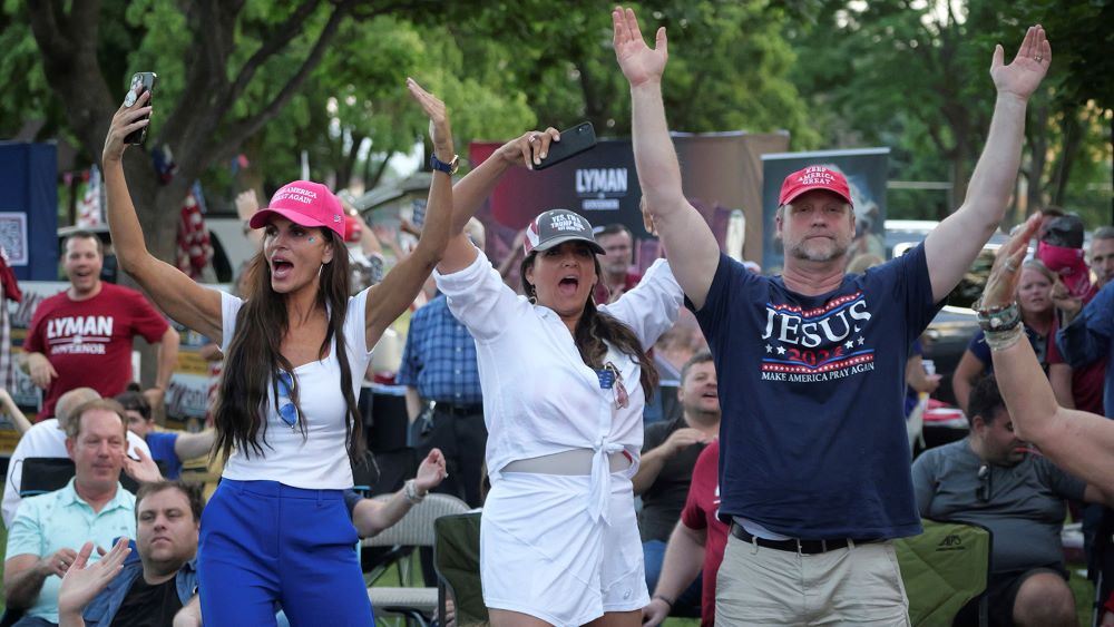 Republicans attend a rally for Trump-backed U.S. Senate candidate Trent Staggs and others on June 14, 2024, in Orem, Utah. 