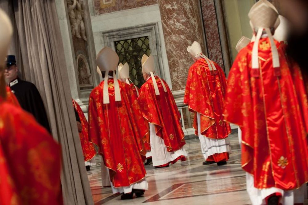 Cardinals enter the Pro Eligendo Pontiface Mass prior to the Conclave, March 12, 2013, at the Vatican.