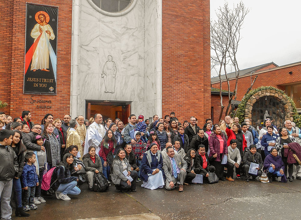 Participants in the Portland Archdiocese's gathering as part of the V Encuentro process pose on Jan. 27, 2018, outside of St. Joseph's Church in Salem, Oregon, where the meeting took place. The local encuentro attracted some 300 parish leaders who discussed priorities for Hispanic/Latino ministry in western Oregon. (NCR photo/Peter Feuerherd)