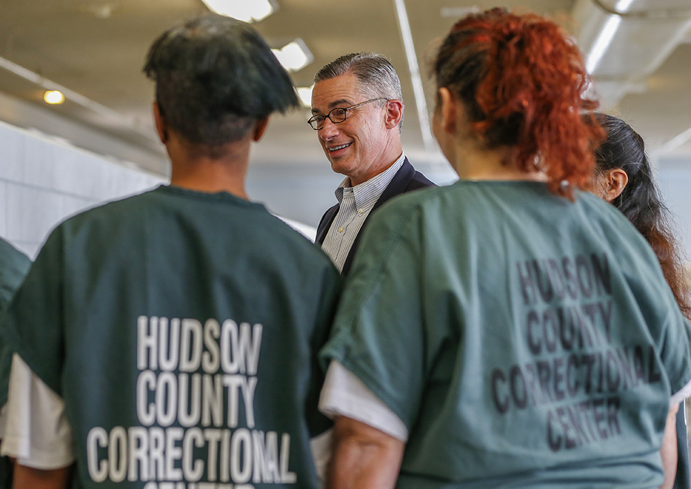 Former New Jersey Gov. Jim McGreevey talks with inmates at Hudson County Correctional Center in Kearny, New Jersey, Aug. 11, 2014. (AP/Rich Schultz)