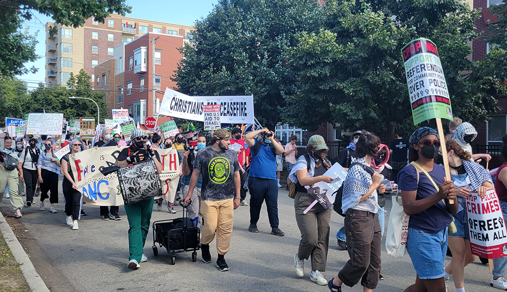 Thousands of protesters participate in the "March on the DNC" on the opening day of the Democratic National Convention, Aug. 19 in Chicago. (NCR photo/Heidi Schlumpf)