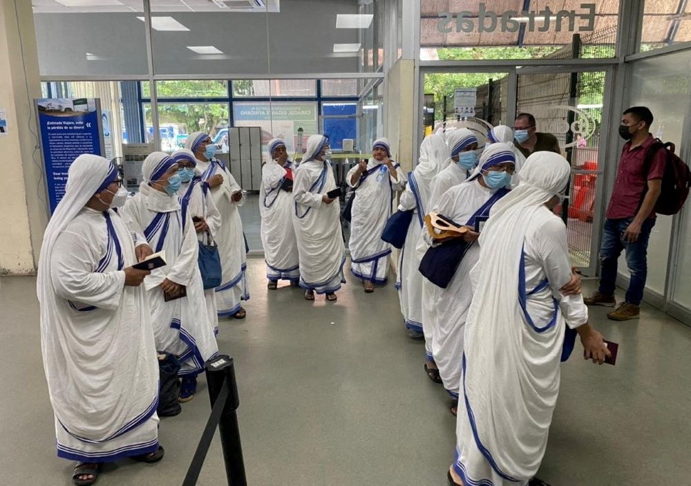 Members of the Missionaries of Charity wait at an immigration office in Penas Blancas, Costa Rica, July 6, 2022, after Nicaragua's government shut down their organization. 